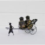 Chinese silver 'rickshaw' cruet set comprising salt and pepper pot, stamped Sterling Hong Kong, 15cm