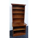 A bookcase with under cabinet, 186 x 86cm From the residual contents of a West Coast Family