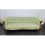 A Victorian sofa, with pale green upholstered back arms and seat on carved cabriole supports,