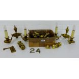 A pair of brass twin branch wall lights, brass door knobs and handles etc., (a mixed lot)