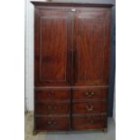 A mahogany hall cupboard with internal hat and coat hangers, 194 x 116cm From the residual