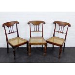 Three walnut side chairs with shaped top rail over spindle backs, with canework seats, 84 x 46cm, (