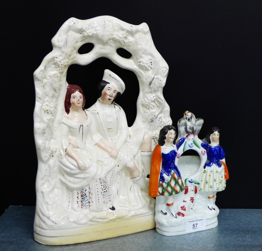 A Staffordshire flat back Queen Victorian and Prince Albert figure group, together with a Poor