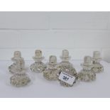 A set of eight moulded glass door handles, (8)