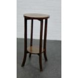 A circular two tier plant stand, 80 x 38cm