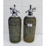 Two vintage mesh covered and glass siphons, (2)