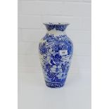 A Chinese blue and white high shouldered baluster vase painted with flowers and foliage, 20cm high