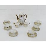 A Bareuther porcelain coffee set comprising six cups, six saucers, coffee pot, cream jug and sugar