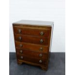 An oak five drawer chest, 104 x 76cm