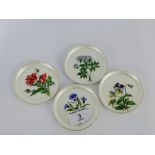 A set of four Danish Sterling silver and enamel pin dishes designed by A. Michelsen of Copenhagen,
