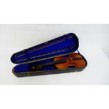 A violin in fitted case together with two bow