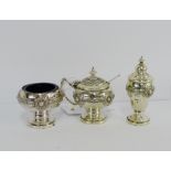 A George VI Birmingham silver celtic knotwork patterned three piece condiment set with makers