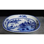 A Chinese blue and white oval 'Pagoda' pattern serving dish, 33cm long