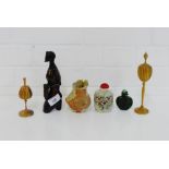 A mixed lot to include a carved African hardstone figure, two small turned wooden vases, a stoneware