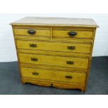 A light oak chest with two short and three long drawers, 92 x 100cm