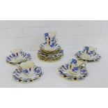 An Aynsley blue and white porcelain teaset comprising six cups, ten saucers and eleven side plates