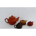 A group of four Yixing type teapots, (4)
