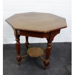 An octagonal topped oak table, 78 x 84cm