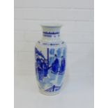 A Chinese blue and white baluster vase painted with figures in a garden landscape with six character