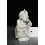 A small white glazed hard paste porcelain female figure, 10cm high
