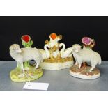 Two Staffordshire Ram and Sheep spill back figures, together with another with Swans, tallest, 13cm,