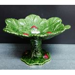 A Portuguese green glazed leaf moulded and strawberry pattern comport