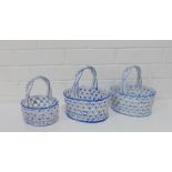 A set of three Portuguese blue and white pottery baskets, (3)
