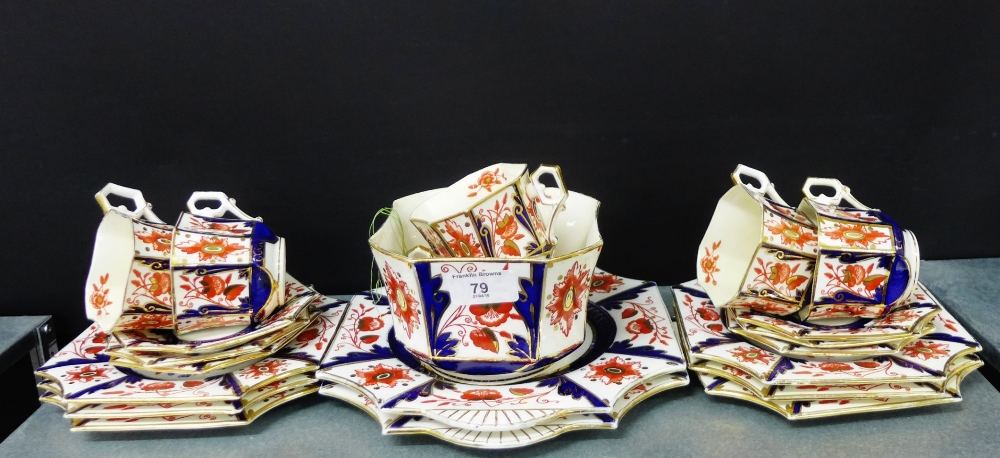 A 19th century Staffordshire Imari patterned porcelain tea set comprising twelve cups, twelve