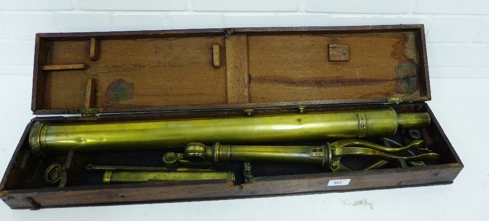 A brass telescope with a tripod stand and fitted box, telescope length 75cm