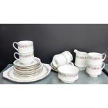 A Paragon 'Belinda' patterned china teaset with six cups, six saucers, six side plates, two cake