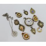 A collection of early 20th century fob medals to include silver, gilt metal and enamel together with
