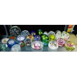 A collection of twenty-seven various glass paperweights, (27)