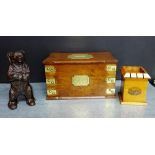 A collection of money banks to include a standing bear figure, a Mauchline box and an oak and