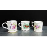 A group of three porcelain mugs to include Coalport and Royal Crown Derby 'Derby Posies' pattern, (