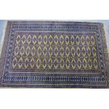 An Eastern rug with multiple borders, 195 x 125cm