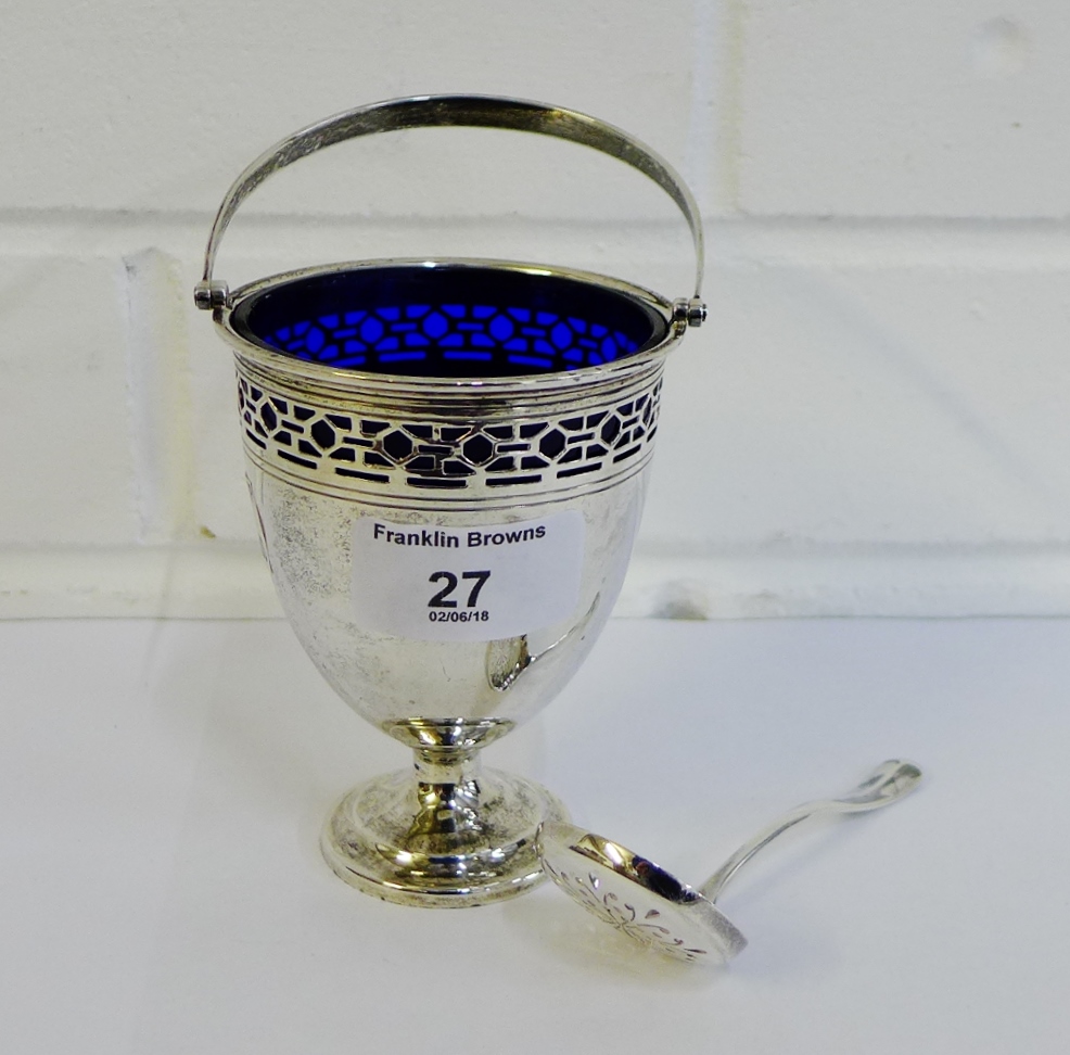 George VI silver sugar basket with blue glass liner, swing handle and pierced top rim with makers