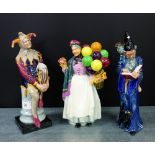 A collection of three Royal Doulton porcelain figures to include 'The Jester' HN2016, 'Biddy