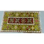 A Turkish rug with olive green field and allover geometric design, 160 x 92cm