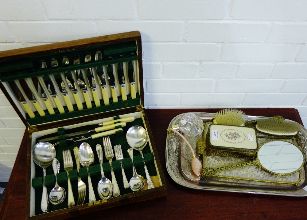 A mixed lot to include an oak cased cutlery canteen, an Epns tray, gilt metal dressing table set and