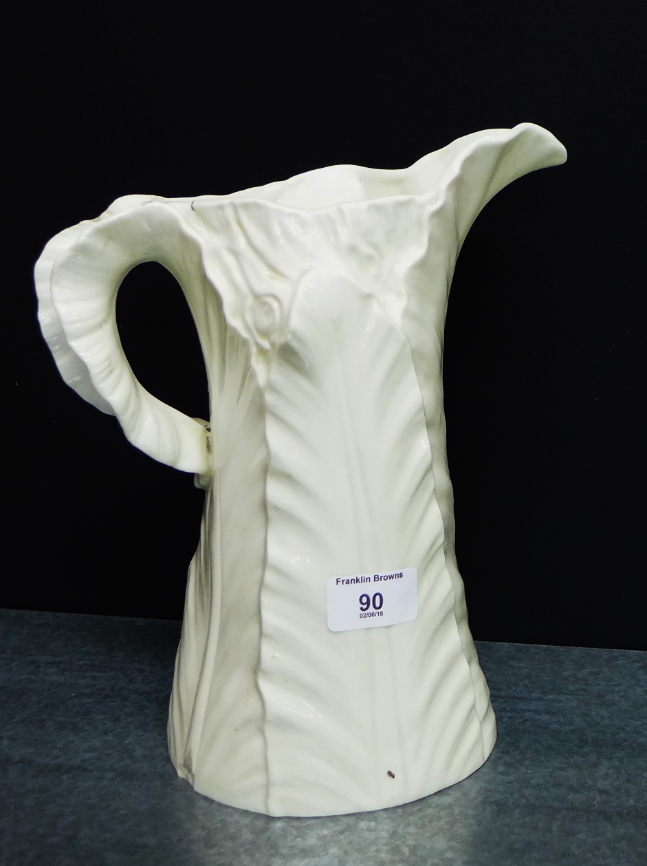 A Royal Worcester cream glazed leaf moulded porcelain jug with puce backstamp, 26cm high