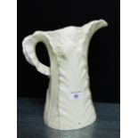 A Royal Worcester cream glazed leaf moulded porcelain jug with puce backstamp, 26cm high