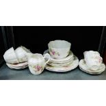 A Staffordshire porcelain floral pink rose patterned teaset, comprising six cups, six saucers, six