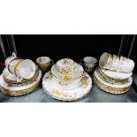 Turin patterned porcelain teaset painted with floral pattern and gilded rims comprising ten cups,