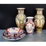 A group of three Imari vases, a small bowl and a plate, (5)