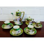 A Noritake coffee set painted with riverside landscape, comprising coffee pot, twin handled sugar