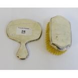 A miniature silver backed hand mirror and clothes brush, Birmingham 1926 (2)