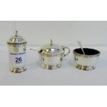 George V silver three piece condiment set comprising salt and mustard with blue glass liners and a