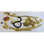 A collection of gilt metal costume jewellery to include bracelets, earrings and necklaces, etc (a