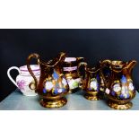 A collection of five various copper lustre jugs, together with a Sunderland lustre style jug, (6)