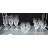 A set of six crystal wine glasses, together with six champagne glasses and five punch glass cups, (